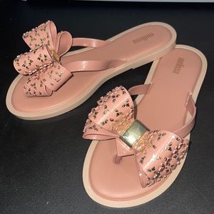 Blush pink and gold Melissa flip flops